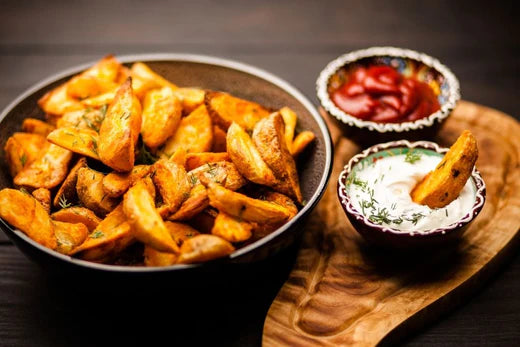 Cajun Style Roasted Potato Wedges With Spicy Sauce