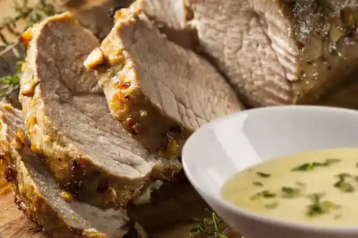 Herb Crusted Pork Loin With White Wine Sauce