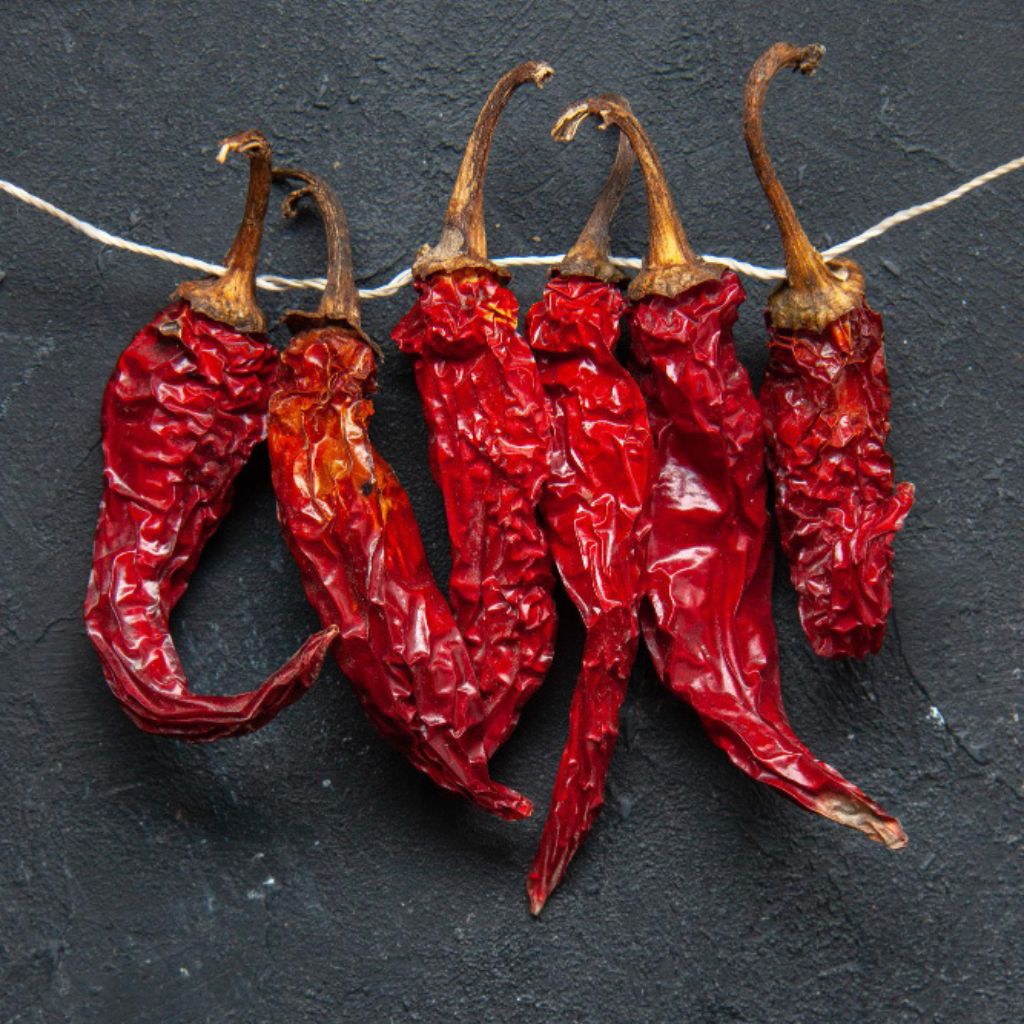 Ancho pepper Ancho chili recipes Southwestern cuisine Mexican dried peppers Ancho pepper spice Smoky pepper flavor Ancho chili sauces Ancho chili rub Spicy pepper dishes Ancho pepper marinade Ancho pepper uses Ancho chili-infused
