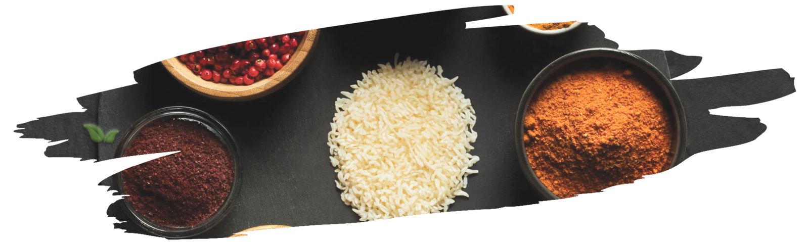 chef garnishing basmati rice with garam masala demonstrating traditional dish
