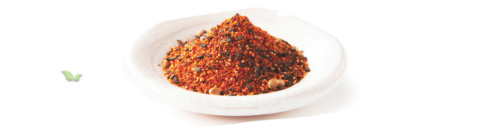 Japanese dishes garnished with shichimi togarashi demonstrating traditional use