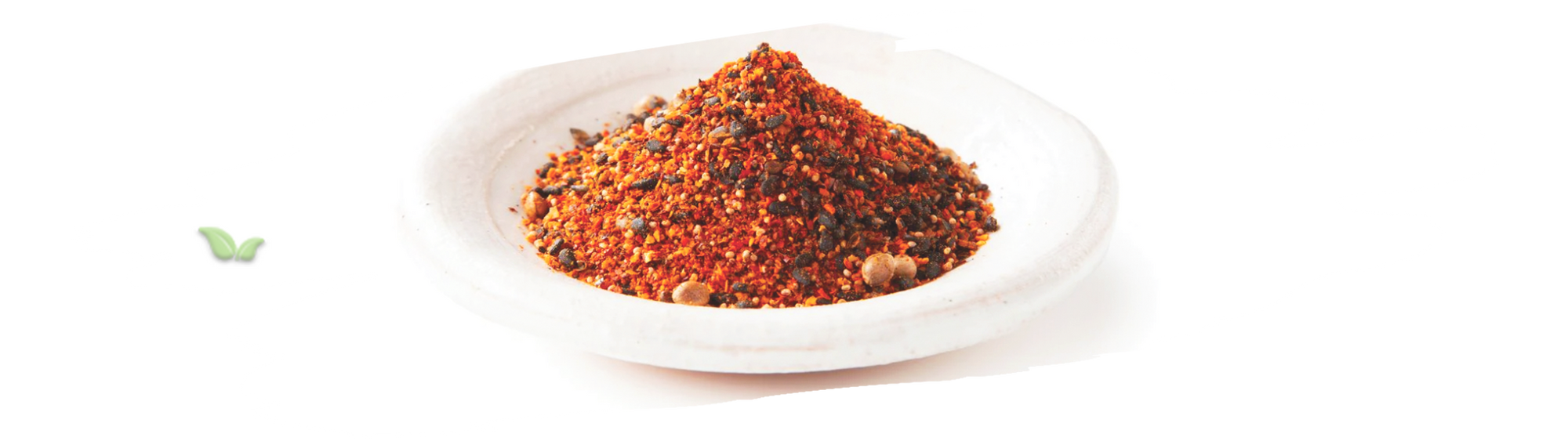 Japanese dishes garnished with shichimi togarashi demonstrating traditional use