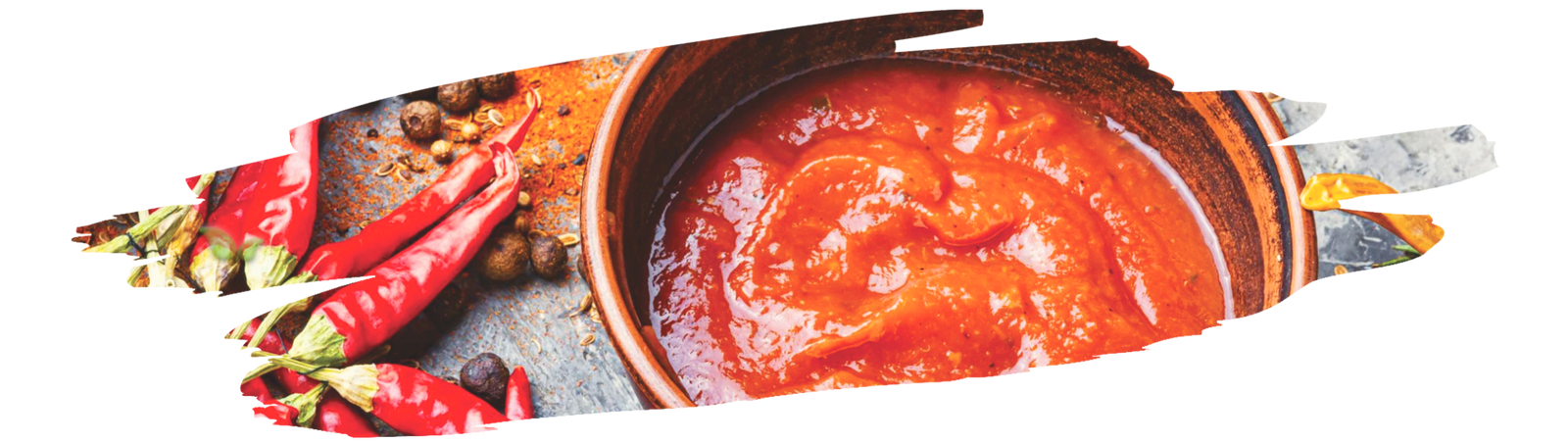 chef blending cayenne peppers and vinegar showing how to make hot sauce at home