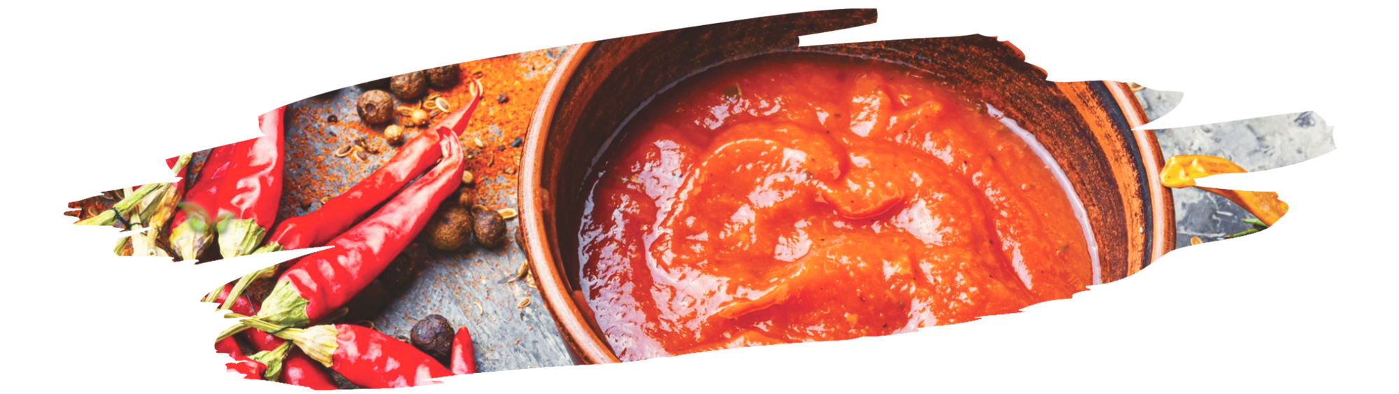 chef blending cayenne peppers and vinegar showing how to make hot sauce at home