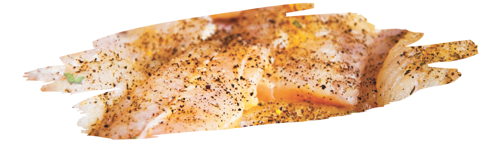 chef applying catch of the day seasoning to fish fillets for delicious seafood taste