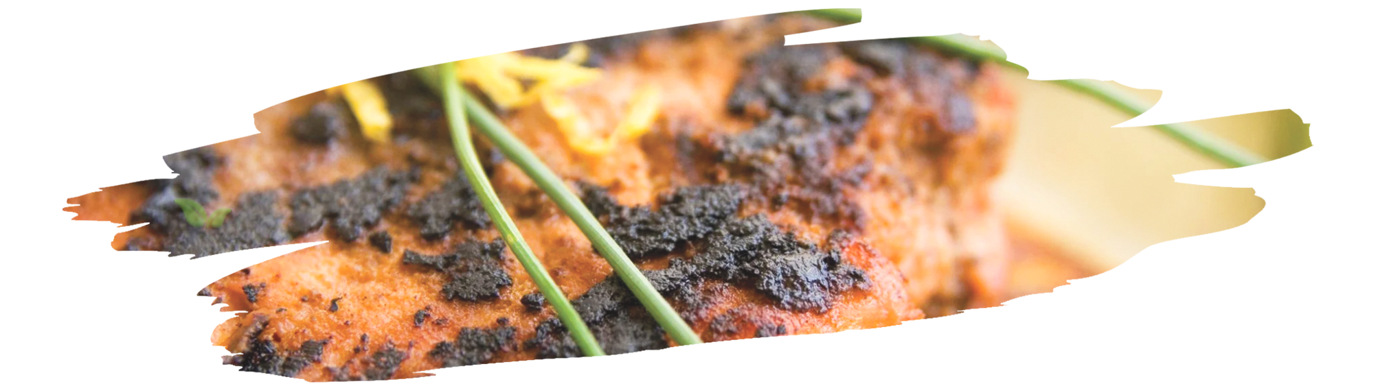 Traditional blackened redfish with vibrant Cajun spices