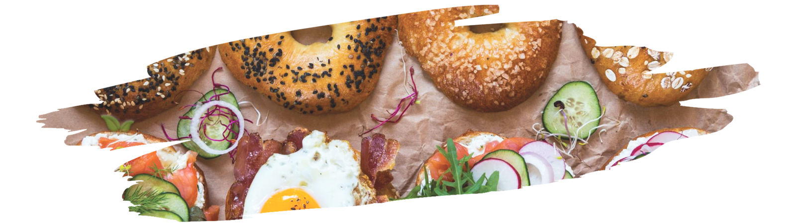 variety of colorful vegan bagel toppings made with vegetables spices and dairy free spreads
