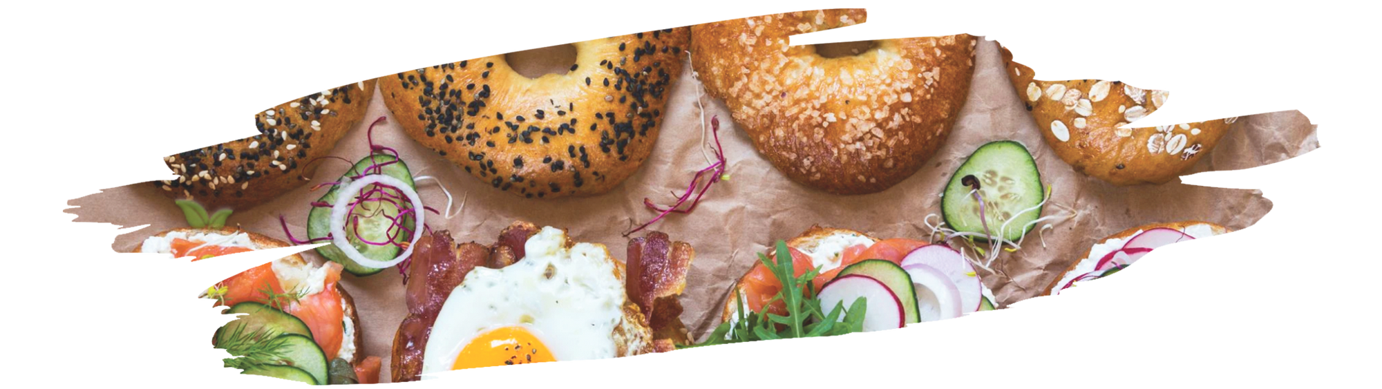variety of colorful vegan bagel toppings made with vegetables spices and dairy free spreads