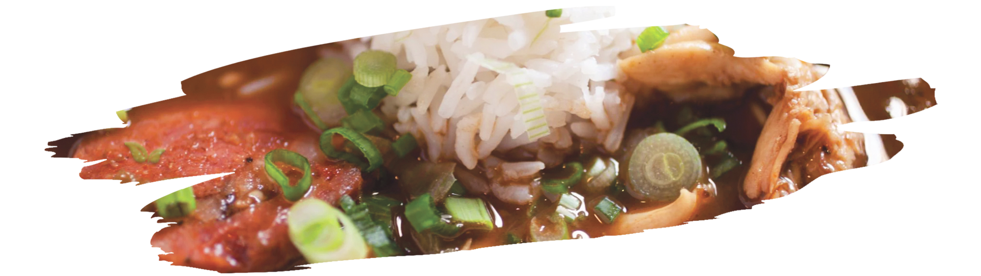 Gumbo filé being added to a pot of traditional Louisiana gumbo.