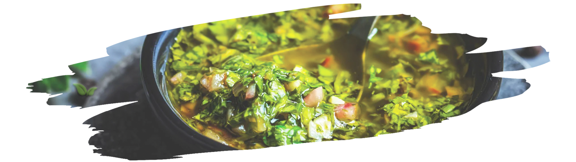 Grilled steak topped with vibrant green chimichurri sauce for authentic flavor