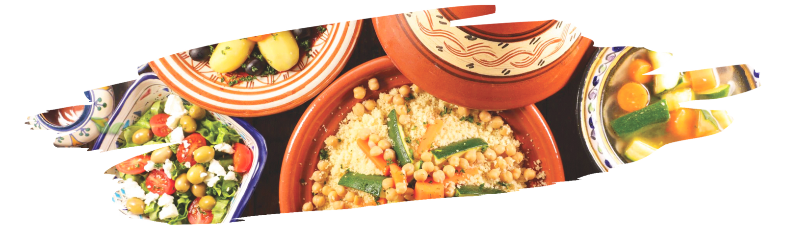 Moroccan market stall filled with vibrant spice cones and aromatic herbs