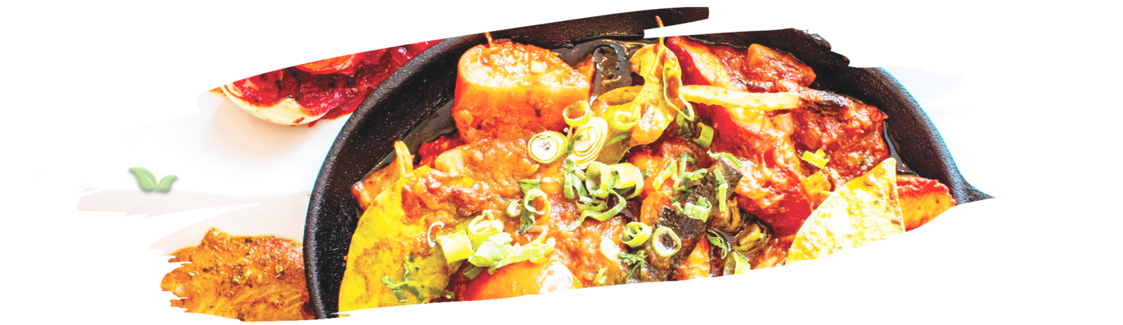 Latin seasoning blend with cumin, oregano, and chili powder in small bowl