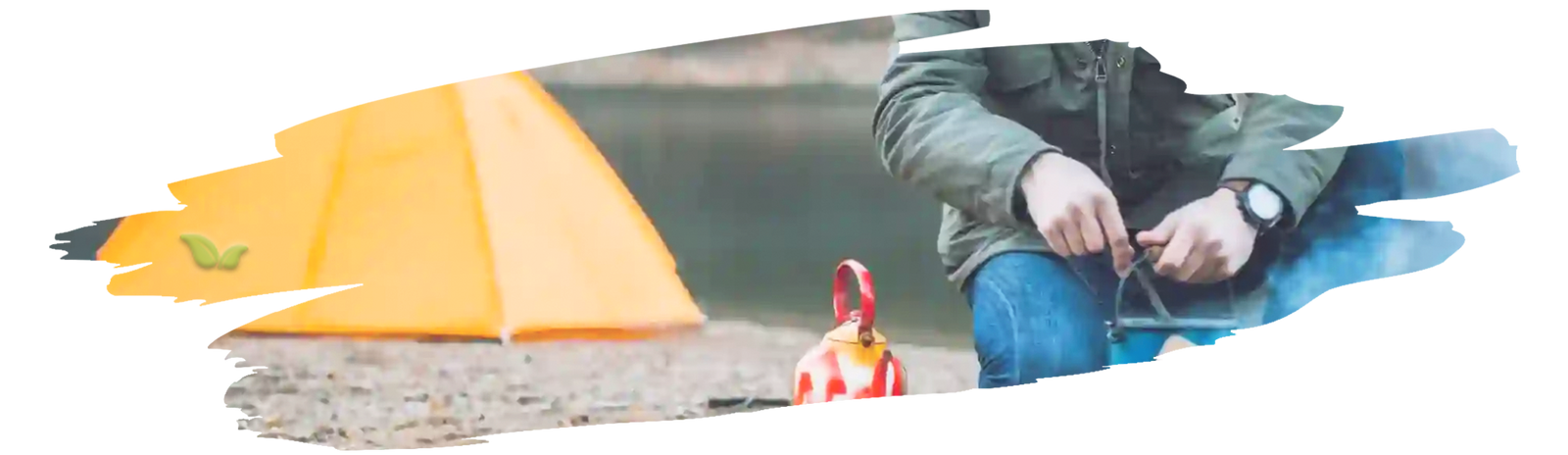 Camper preparing ingredients and cookware for outdoor barbecue in nature