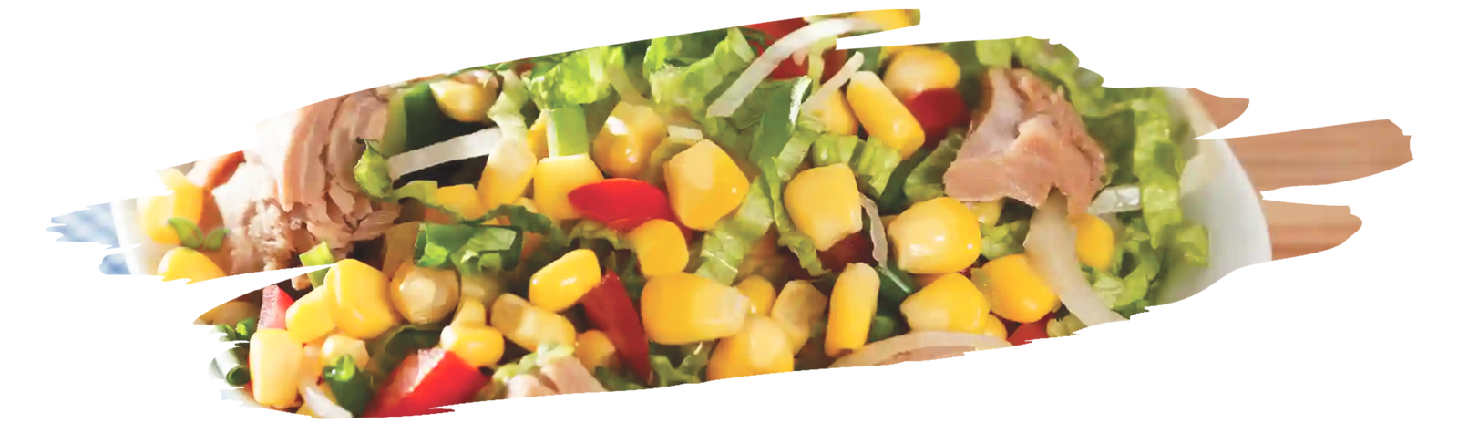 Person mixing tuna salad ingredients in glass bowl on kitchen counter