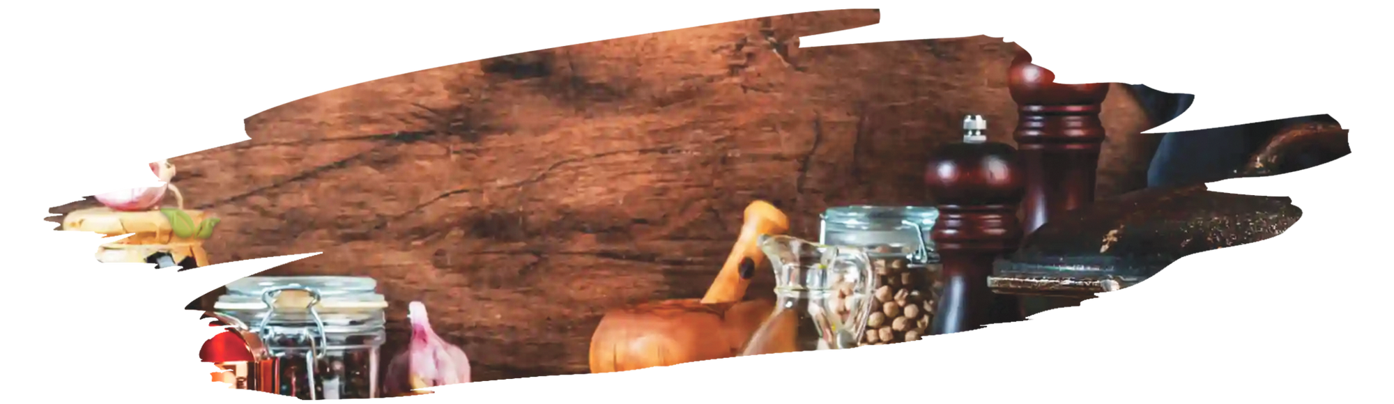 Person grinding fresh spices in a stainless steel grinder for cooking