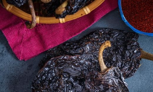 what is difference between ancho pepper and regular pepper?