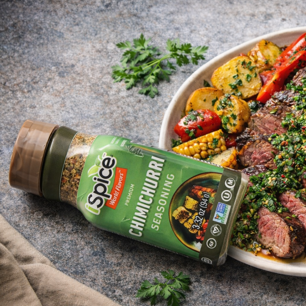 Spice World Flavors Chimichurri seasoning bottle with a dish of grilled vegetables and meat on a stone surface.