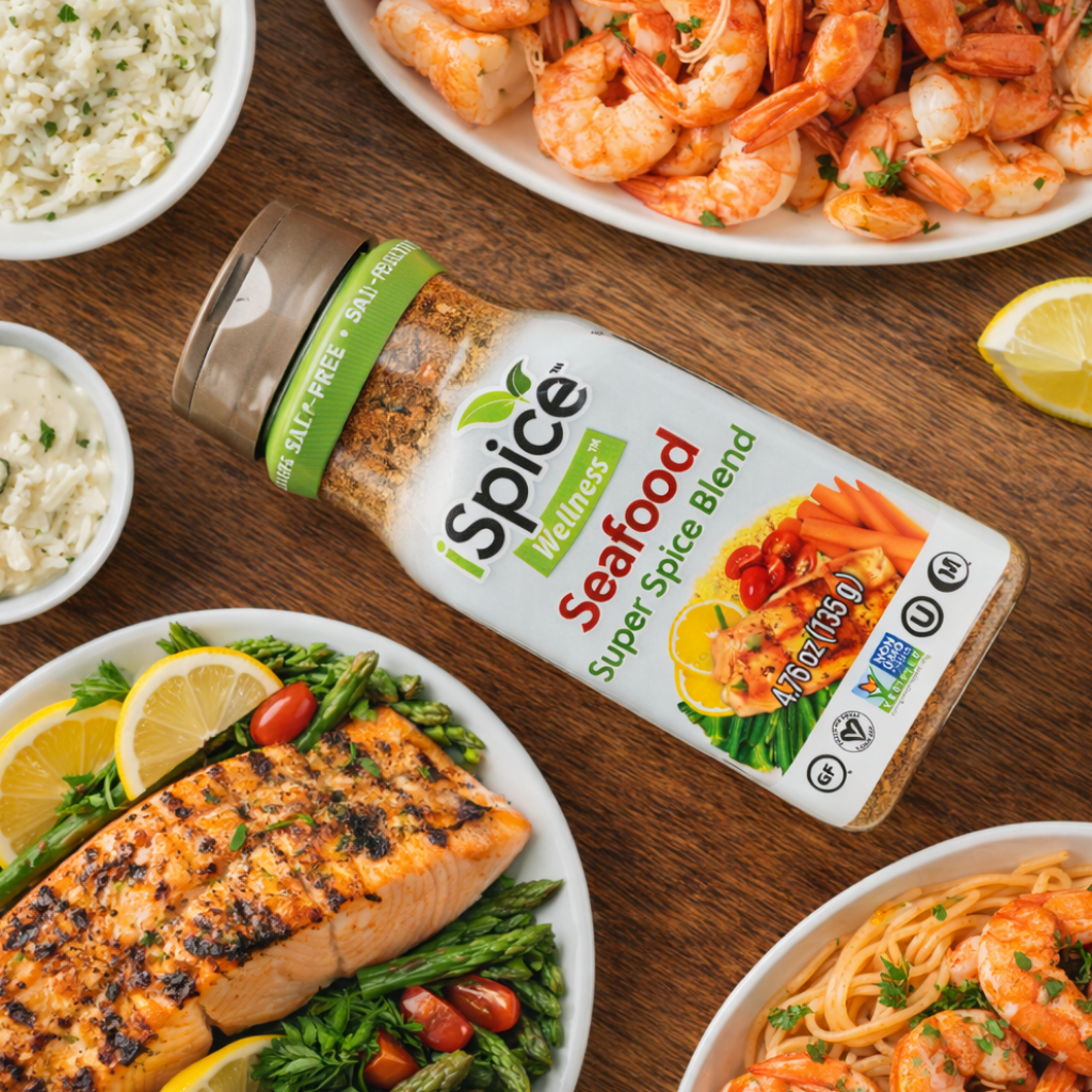 Spice World Seafood Super Spice Blend bottle with seafood dishes on a wooden table
