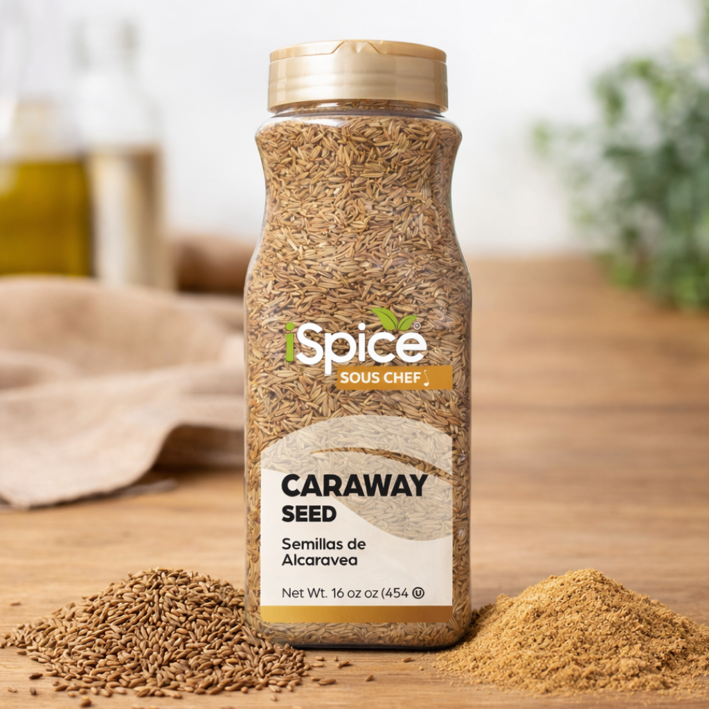 Bottle of iSpice Sous Chef Caraway Seed on a wooden surface with caraway seeds and powder around.