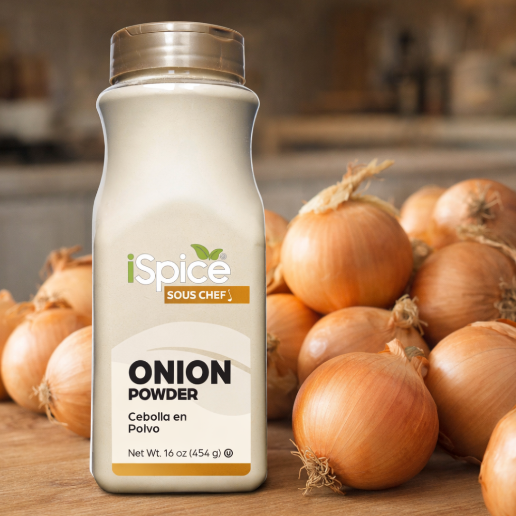 iSpice Onion Powder bottle with onions on a wooden surface