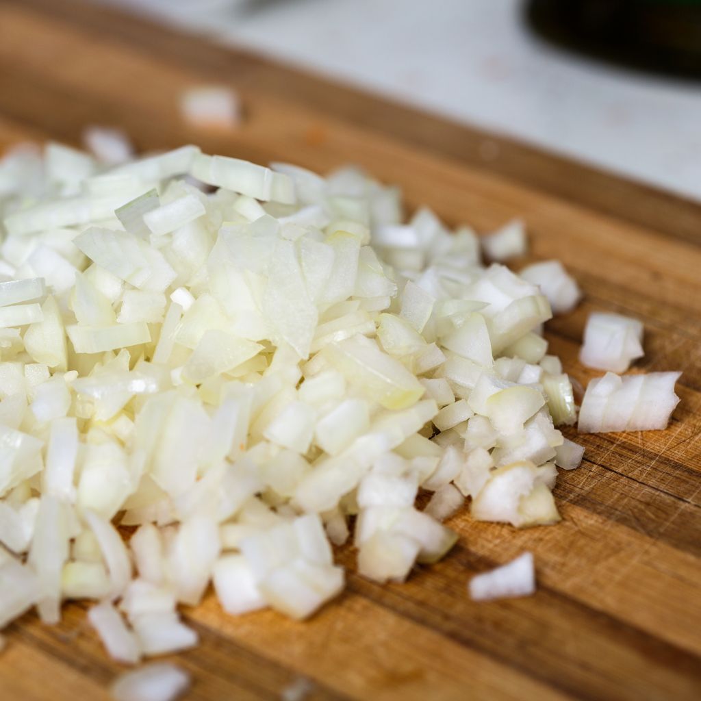 Minced onion uses Culinary applications of minced onion Cooking with minced onions Onion flavor in minced form Incorporating minced onions in dishes Minced onion recipes Tips for mincing onions Minced onion sautéing Minced onion in marinades