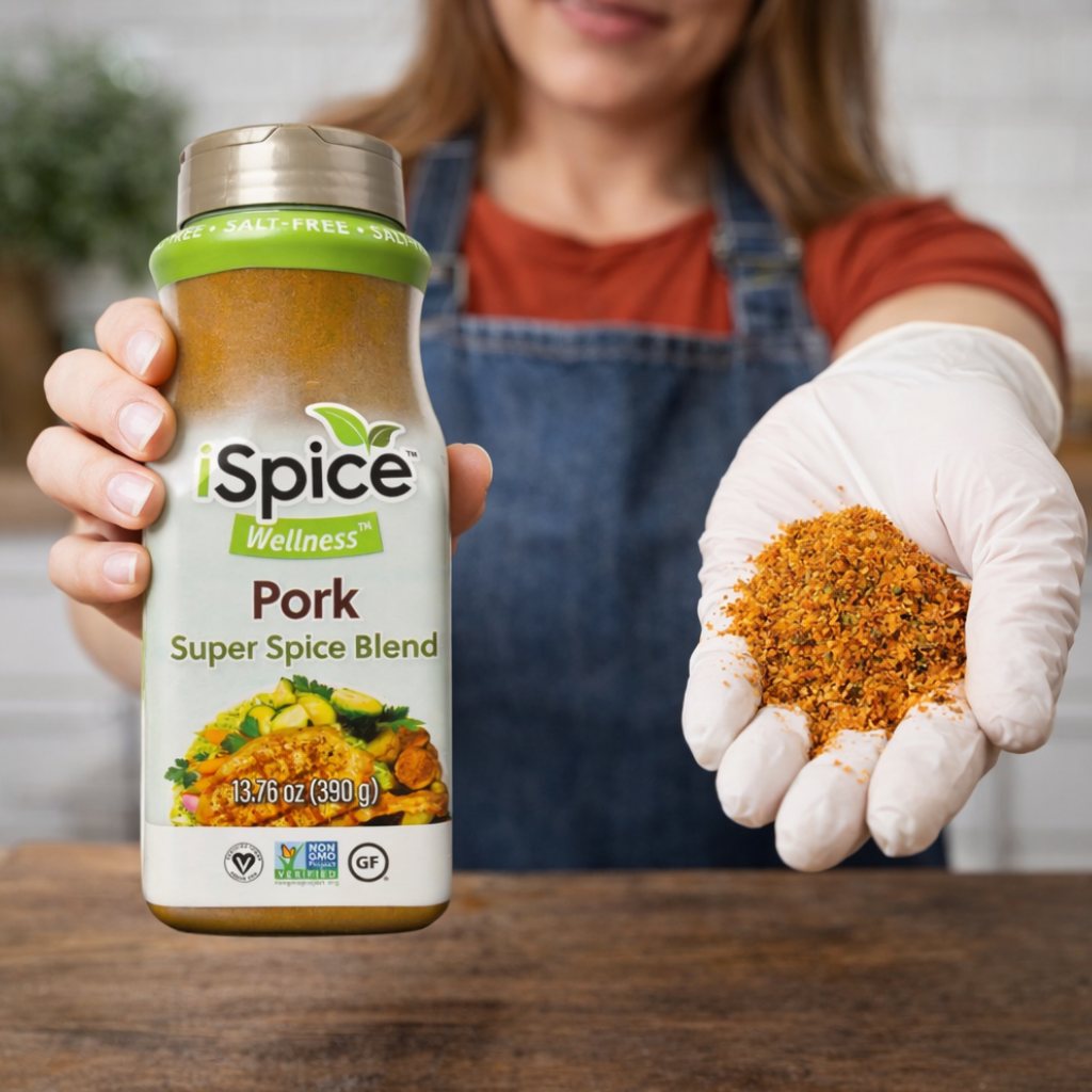 Person holding a bottle of iSpice Wellness Pork Super Spice Blend and showing some spice in their hand.