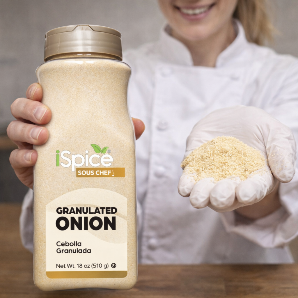 Person holding a bottle of iSpice granulated onion with a visible amount of onion powder.