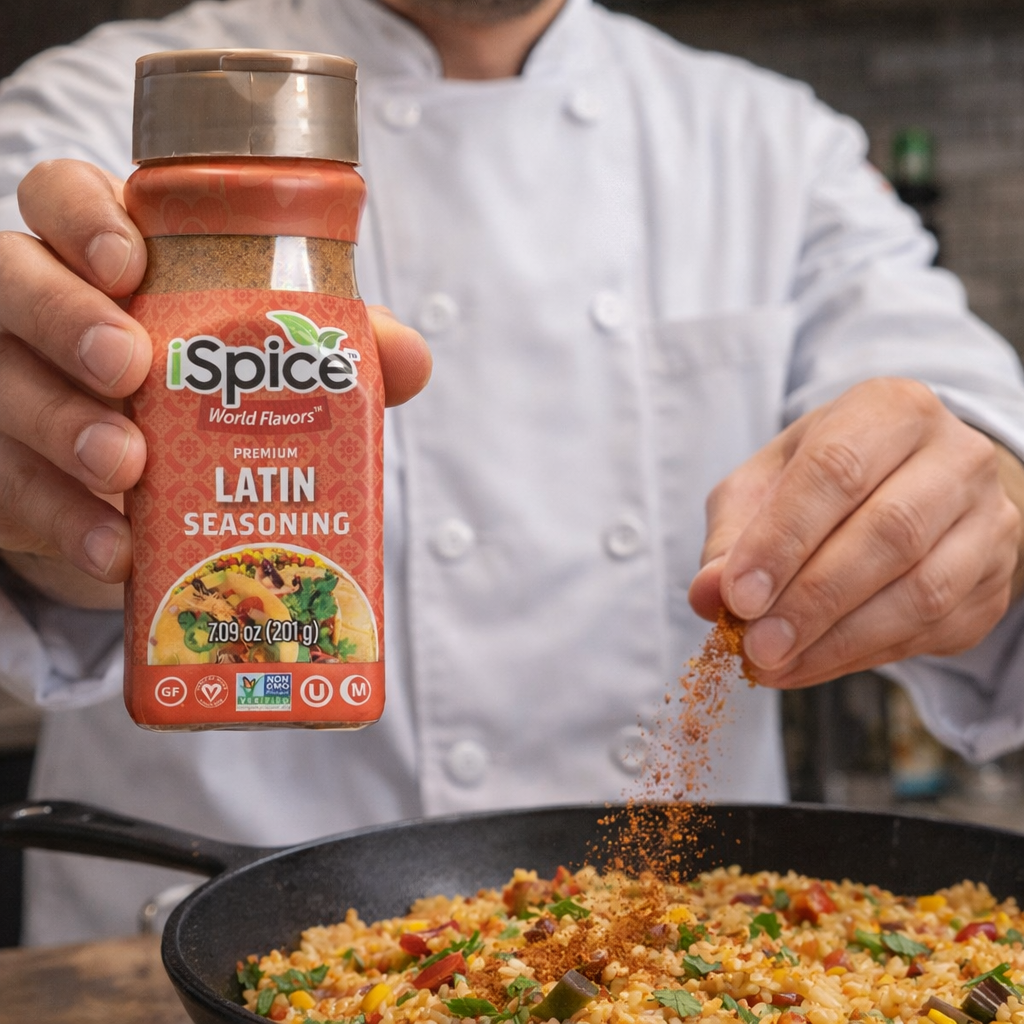 Person sprinkling I Spice Latin seasoning into a pan of food