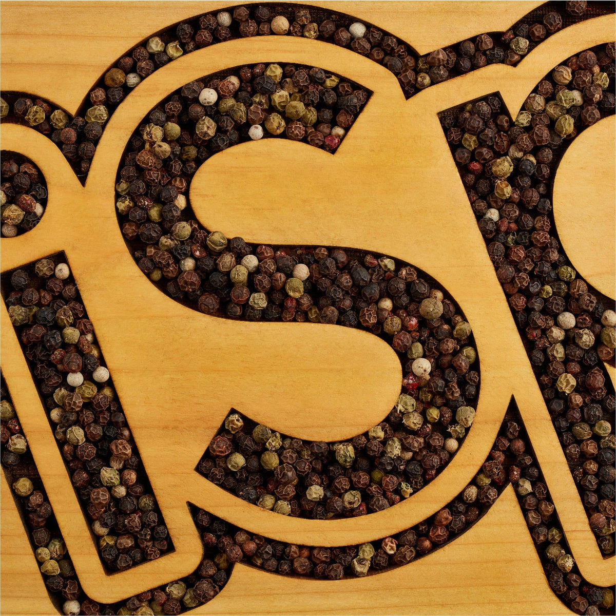 An Uplifting Blend of Black, Green, White and Pink Peppercorns